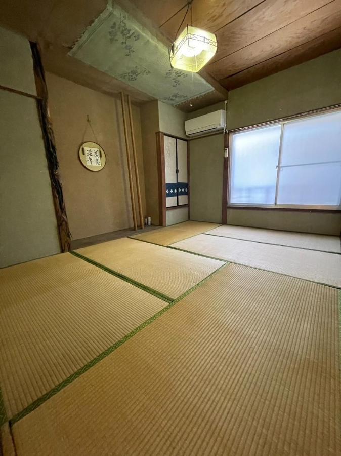 素泊まり民宿とみや Oshima Exterior foto